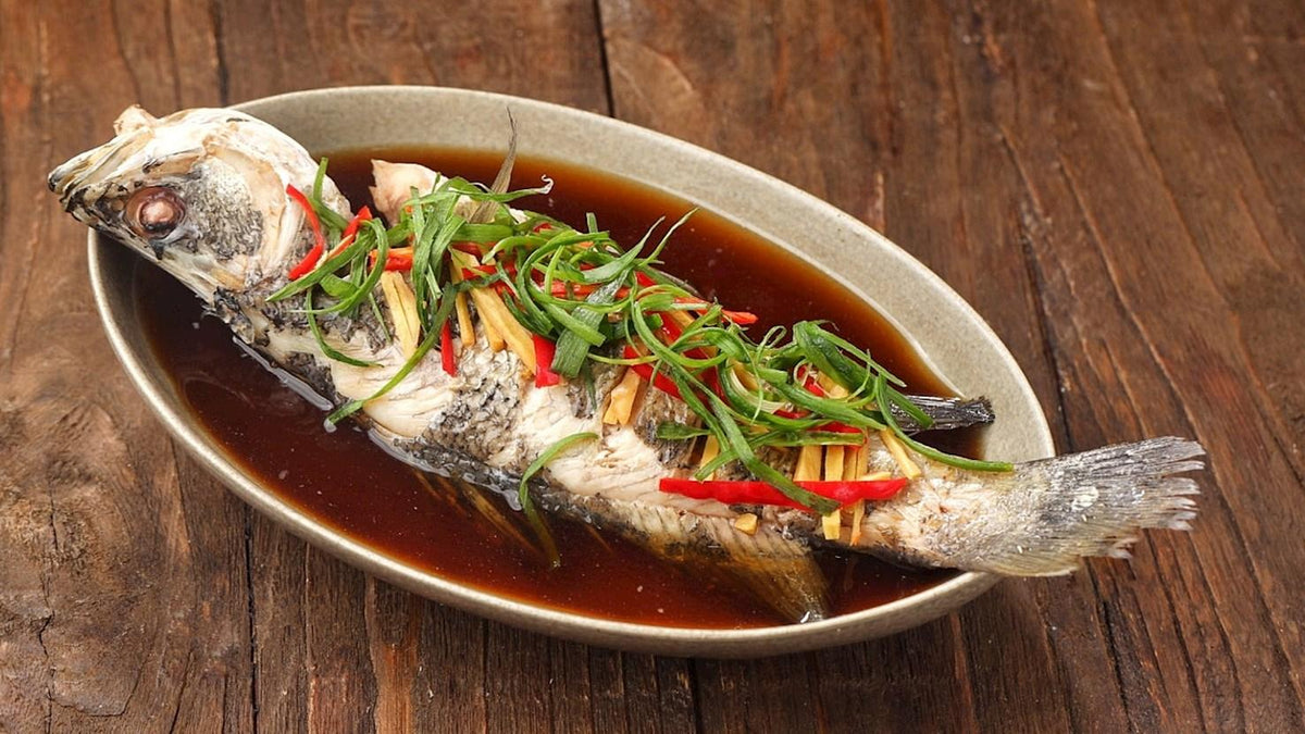 Cantonese steamed fish with ginger and spring onion, a classic example of Chinese seafood cuisine