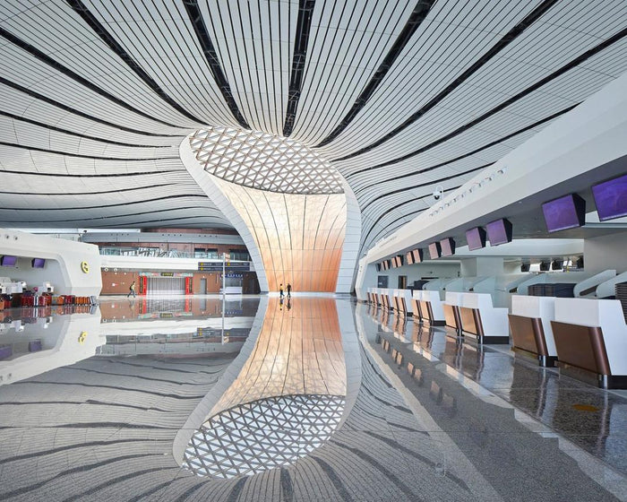 Modern international airport terminal in China with travelers arriving